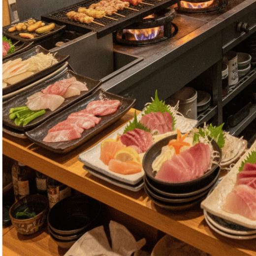 活気あふれる厨房で調理するシェフの様子